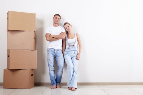 Man with van service loading furniture for a small move