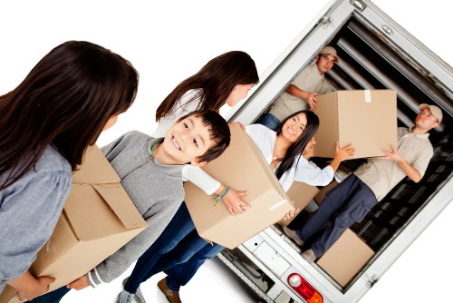 Local team collecting bulky furniture from a home in Hire