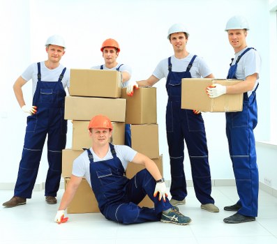 Local movers loading a home move in Hire
