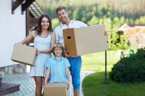 Loading furniture and boxes into a van for a house move