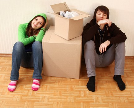 Local moving service unloading items at a Hire property
