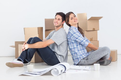 Professional movers loading furniture in a Hire property