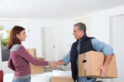 Careful loading of furniture from a property with tight access in Hire