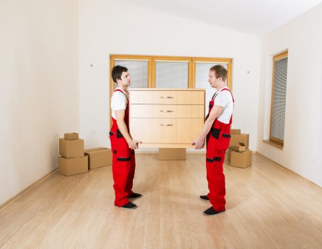 Busy moving day with boxes and careful access planning in Hire
